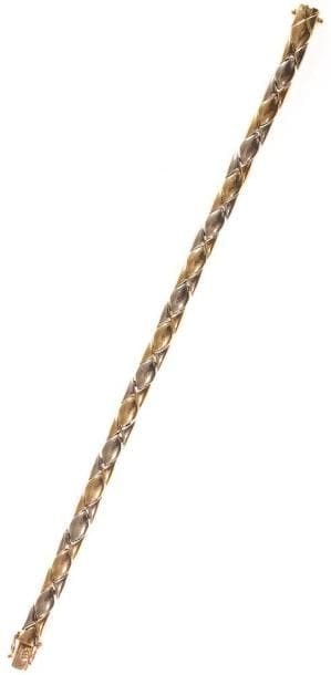 CARTIER
Bracelet modèle Rumba en trois tons...