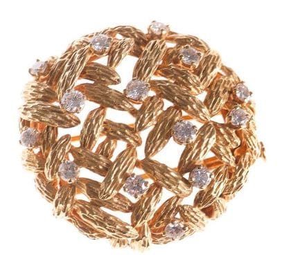 MAUBOUSSIN
Broche-clip en macaron d'or jaune...