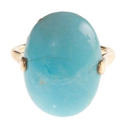 Bague en or jaune, ornée d'une turquoise...