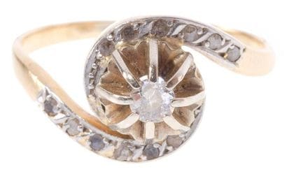 Bague tourbillon en or jaune et gris, sertie...