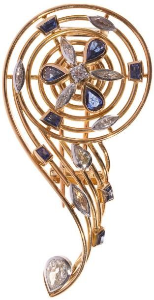 Broche-clip en fils d'or jaune, piquée de...