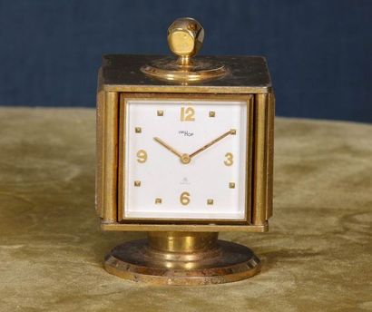 PENDULE DE BUREAU PIVOTANTE FORMANT BAROMETRE...