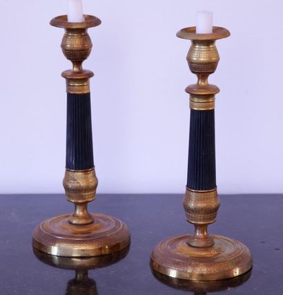 PAIR OF CANDLEHOLDERS

Restoration Period

Patinated...