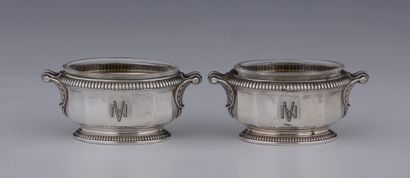 PAIR OF OVAL SALONS with cut sides, silver...