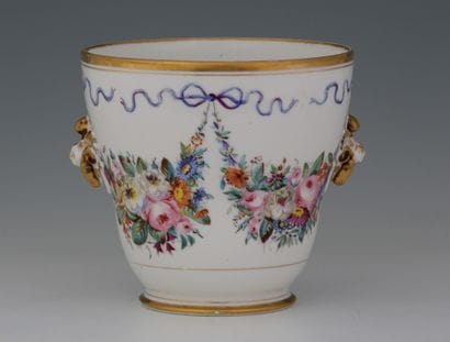 A white and gold porcelain CACHE-POT OF HORN...
