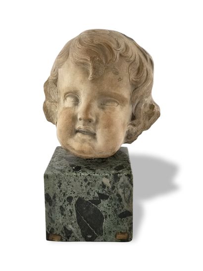 TETE DE PUTTO (fragment de statue) d'Epoque...