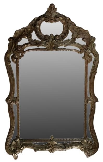 MIROIR A PARECLOSES de forme mouvementée...