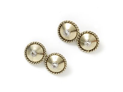 Paire de boutons de manchettes en or gris...