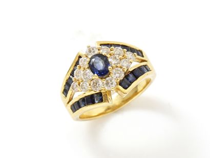 Bague jonc en or 750 millièmes centrée d'un...