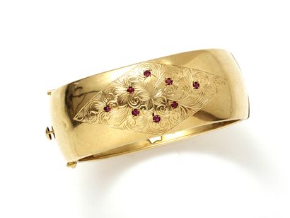 Bracelet jonc bombé ouvrant en or 750 millièmes...