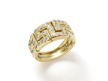 Bague jonc en or 750 millièmes à décor géométrique...