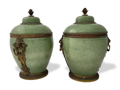 Pair of Regency style covered pots from the...