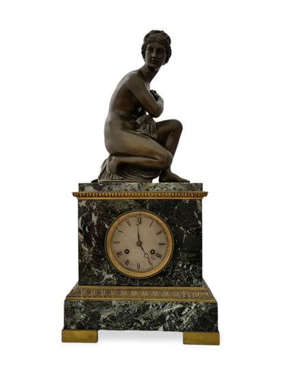 A Louis-Philippe period clock decorated with...