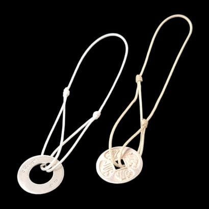Dinh VAN - Lot of TWO cord BRACELETS holding...