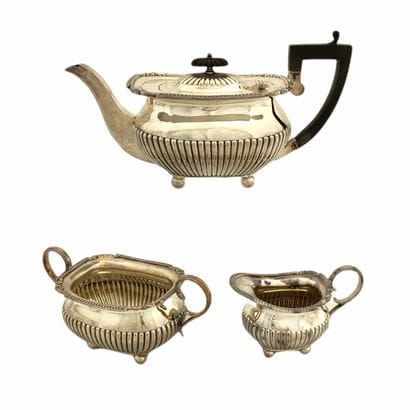3 PIECES TEA SERVICE in silver plated metal...