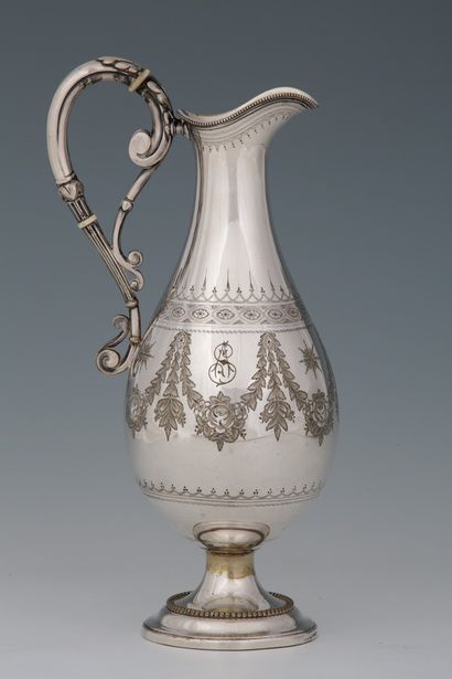 A silver-plated HOT WATER POT by EKLIGNTON...