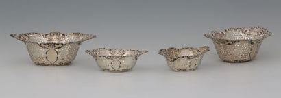 TWO PAIRS OF SMALL OVAL BORNERS in silver...