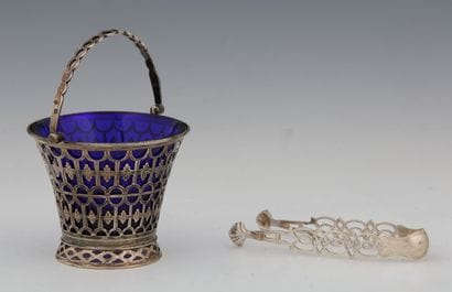 Silver sugar bowl with handle and sugar tongs...