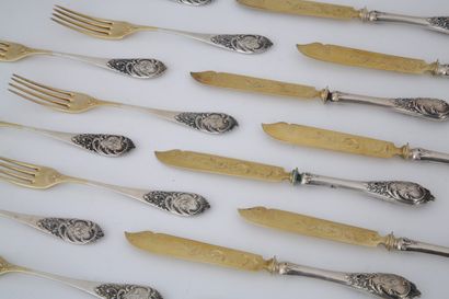SET OF 12 LUNCH CUTLERY in silver and vermeil...