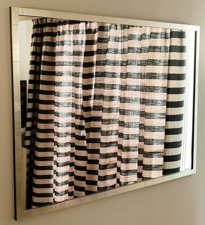 MIROIR A ENCADREMENT « RONCE » en bois argenté....