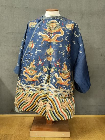 CHINA, XXth Century - SMALL DRESS in embroidered...