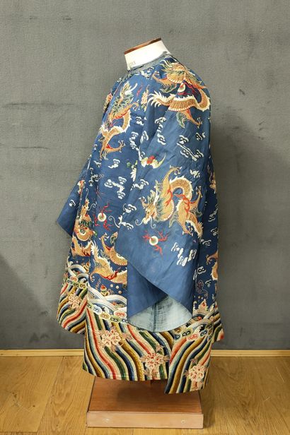 CHINA, XXth Century - SMALL DRESS in embroidered...