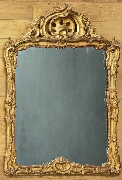 MERCURY MIRROR in a Louis XV period carved...