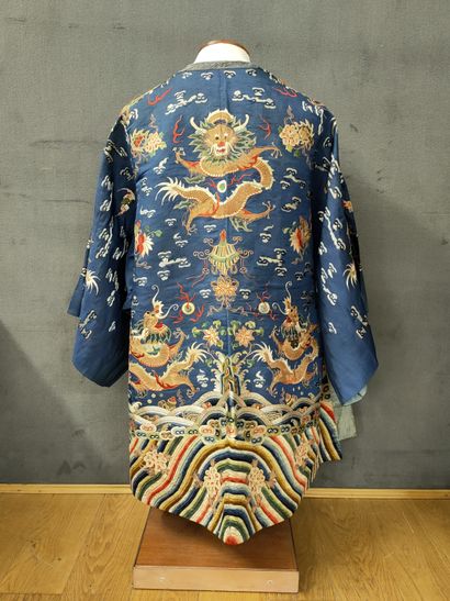 CHINA, XXth Century - SMALL DRESS in embroidered...