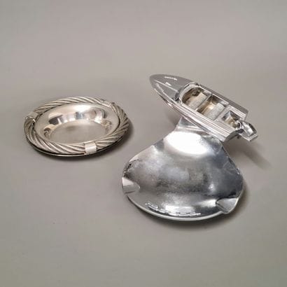 2 ASHTRAYS Circa 1970, one in silver plated...