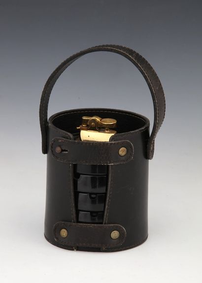 Black bakelite and gilt metal ASHTRAY AND...
