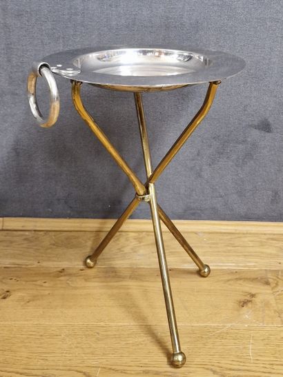 A 1960's era end table with a round tray...