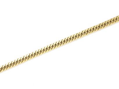 BRACELET in gold 750 thousandths, flat gourmette...