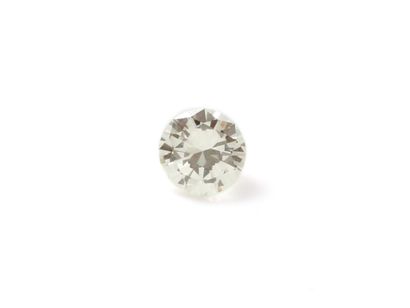 Round brilliant cut diamond on paper.
Weight...
