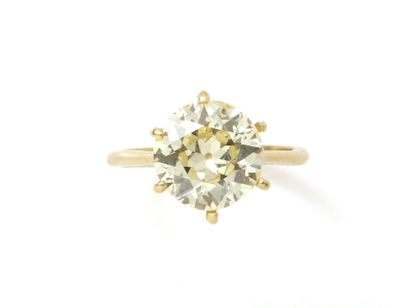 SOLITARY RING in gold 750 thousandths decorated...