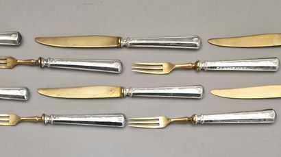 12 LUNCH KNIVES AND 11 FORKS with silver...