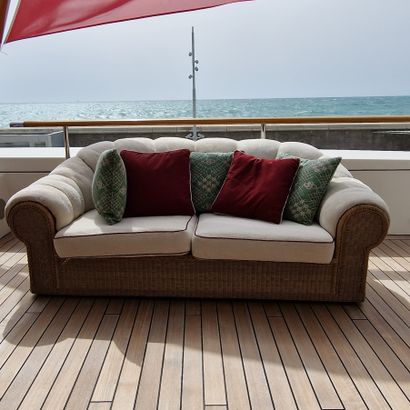 * Art Deco-style modern sofa in wicker-style...