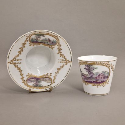A TREMBLEUSE CUP and saucer in porcelain...