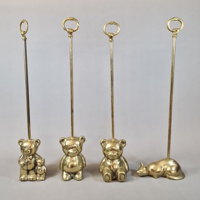 4 bronze and gilt brass DOOR HOLDERS Circa...