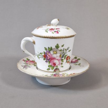 A TREMBLEOUS covered cup and saucer with...