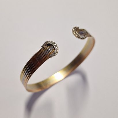 IN THE STYLE OF THE HOUSE OF CARTIER - RIGID...
