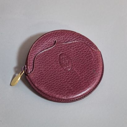 CARTIER - Modern round coin purse in burgundy...