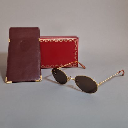 CARTIER - PAIR OF SUNGLASSES in gilt metal,...
