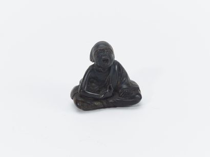 JAPON, XIXe Siècle
Netsuke en bois foncé...
