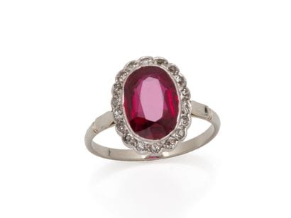 750 thousandths white gold ring set with...