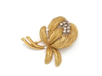 750 thousandths gold clip brooch with chased...