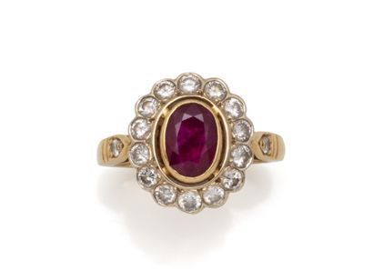 RING in 750 thousandths gold, set with an...