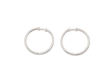 Pair of creole earrings in platinum 850 thousandths...