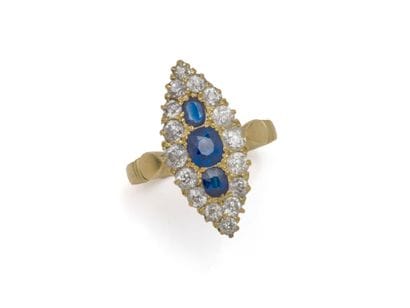 750 thousandths gold marquise ring centered...