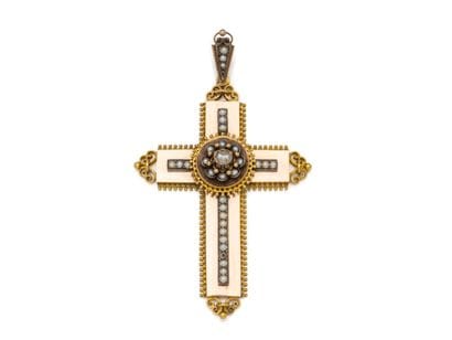 750 thousandths gold PENDANT holding a cross...