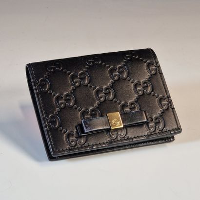GUCCI - GG Suprême black embossed calfskin...